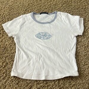 white and light blue “don’t call me baby” brandy melville top